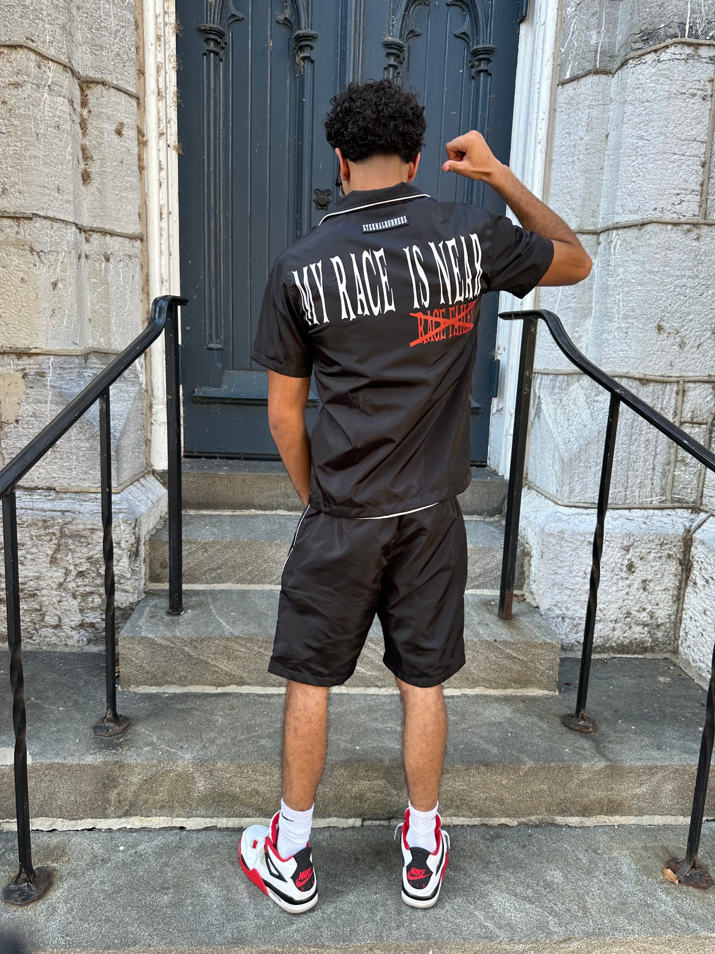 Black “XRACE FAILED” TEE